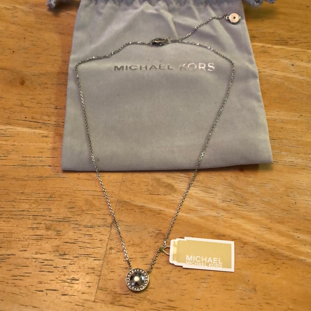 Michael Kors Silver Tone Stainless Steel Round MK Logo Pendant Necklace NWT